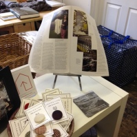 Laura's Loom display unit, showing her article in the Journal
